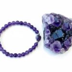 Dames armband Amethist 6 mm met hart kraal