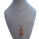 Ketting met een geluksengel van natuursteen Goudvloed