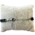 Damesarmband Onyx facet met Onyx connector kraal