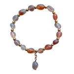 Dames armband vuur Agaat met goudkleurige RVS tussenkralen