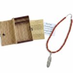 Damesketting met Koraal en veer