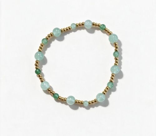 Dames armband Aventurijn 4 en 6 mm met RVS goudkleurige kralen