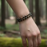 Dames armband Onyx 4 en 6 mm met RVS goudkleurige kralen