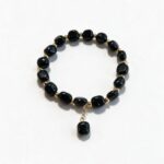 Dames armband Onyx met goudkleurige RVS tussenkralen