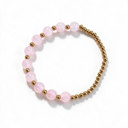 Dames armband Rozenkwarts 8 mm met RVS goudkleurige kralen