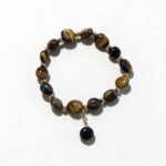 Dames armband Tijgeroog met goudkleurige RVS tussenkralen